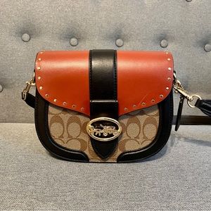 COACH Georgie Saddle Bag In Colorblock Signature Canvas With Rivets